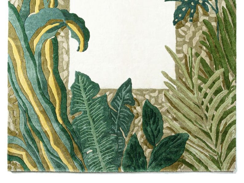 May include: Watercolor illustration of tropical foliage in shades of green, yellow, and brown. The leaves and plants frame a white rectangular space. The artwork has a textured appearance.