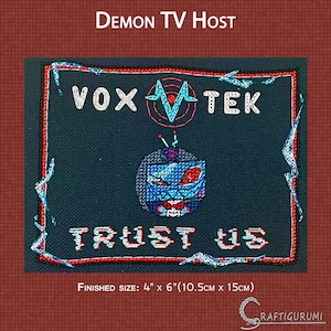 May include: A black and blue cross-stitch pattern featuring a cartoon television with the text "VOX TEK" and "TRUST US" in a red and white pixelated font. The finished size is 4 inches by 6 inches (10.5 cm by 15 cm).