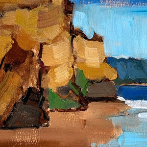 May include: Oil painting of a coastal scene with a cliff face on the left and a beach and ocean on the right. The cliff is painted in shades of brown and tan, with green vegetation. The ocean is blue, and the sky is a light blue.