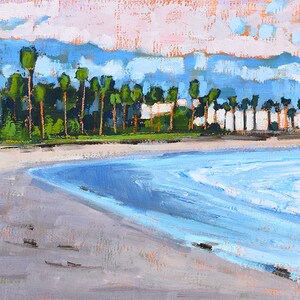 May include: An impressionistic painting of a beach scene. The artwork depicts a sandy beach with gentle waves, palm trees, and buildings in the background. The sky is a mix of blue and pink hues, creating a serene coastal landscape.