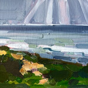 May include: Impressionistic oil painting of a coastal landscape. The artwork depicts a shoreline with green and tan foliage, a blue-gray sea, and a cloudy sky. The brushstrokes are visible, creating a textured effect.