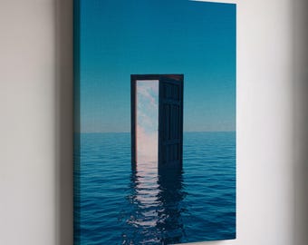 May include: A canvas print depicts a surreal scene of a dark wooden door, slightly ajar, standing in the middle of a vast, calm ocean. The sky above is a gradient of blue, and the door's reflection is visible in the water.
