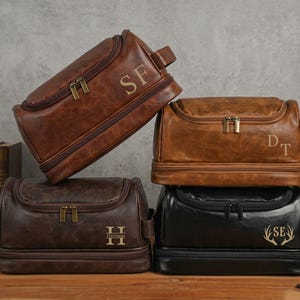 May include: A white ceramic mug with a black handle and the text "But First, Coffee" in a handwritten style. The mug is likely 12-16 ounces, perfect for a morning beverage.