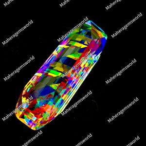 May include: A faceted, elongated gemstone displaying a vibrant, multi-colored iridescent spectrum of red, yellow, green, and blue hues. The surface is covered with the repeating text 'maheragemsworld' in white, set against a solid black background.
