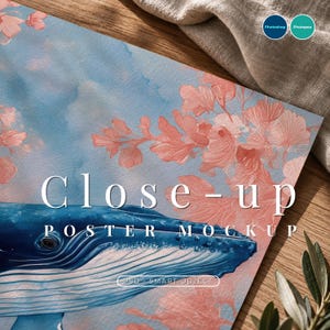 May include: A rectangular poster mockup featuring a blue whale illustration against a light blue background with pink floral accents. The text Close-up POSTER MOCKUP and PSD SMART OBJECT is printed on the surface. Two circular icons are visible.