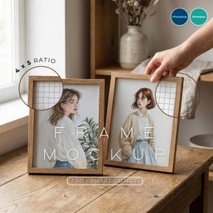May include: Two wooden picture frames with illustrations of women. The frames are on a wooden surface. The text "FRAME MOCKUP" is printed on the frames. The text "4 x 5 RATIO" is printed on the image. The text "PSD SMART OBJECT" is printed on the image.