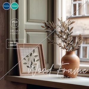 May include: A wooden picture frame mock-up with a botanical print, resting on a windowsill. A terracotta vase with dried foliage sits nearby. The image includes text that says "Wood Frame" and "Mock Up". The frame has a 4:5 ratio and 300 DPI.