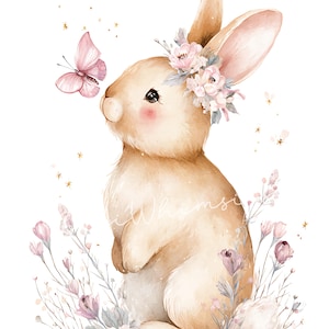 May include: Watercolor illustration of a bunny with a floral crown and a pink butterfly. The bunny is light brown with pink cheeks and is surrounded by pink and purple flowers and gold stars on a white background.