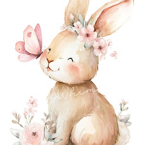 May include: Watercolor illustration of a smiling bunny with a pink butterfly on its nose. The bunny wears a floral crown and is surrounded by pink flowers and greenery. The artwork has a soft, pastel color palette.