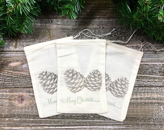 Christmas gift bag - 10 cotton drawstring bags for holiday presents or party favors - Hand stamped with brown pine cones and green text