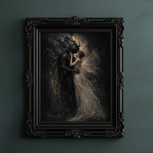 May include: A framed artwork depicts a dark figure embracing a woman with wings. The figures are in a romantic embrace, set against a dark, textured background. The ornate black frame adds a classic touch to the artwork.