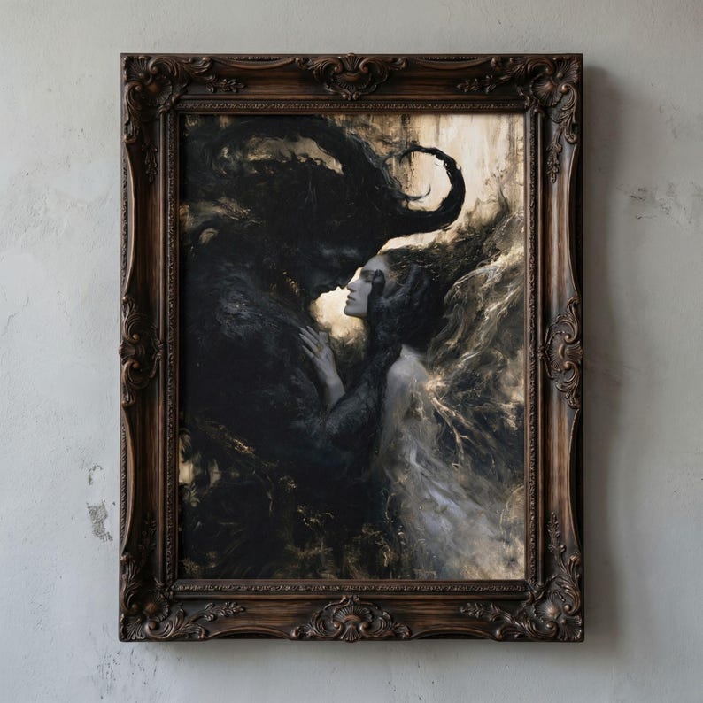 May include: A framed artwork depicts a dark, romantic scene. A dark figure embraces a woman with flowing hair, their faces close. The artwork is in shades of black, white, and gold, with a detailed, ornate brown frame. The overall theme is gothic and romantic.