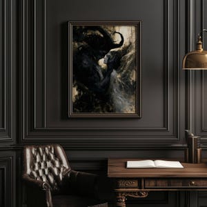 May include: A framed artwork depicting a dark, romantic scene. A woman in a flowing white dress is embraced by a shadowy figure. The artwork is in a dark wooden frame, hanging on a dark wall.