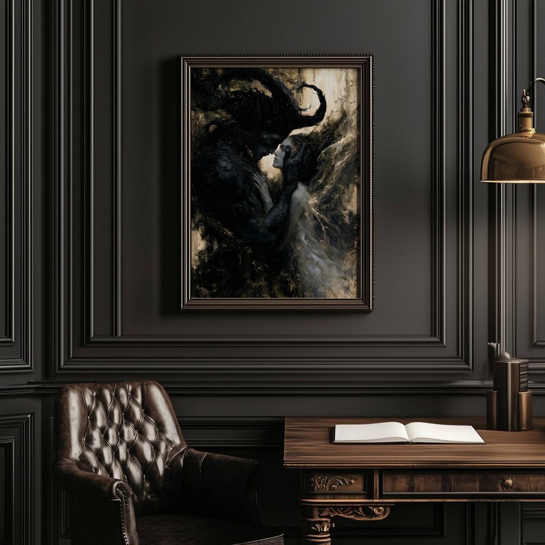 May include: A framed artwork depicting a dark, romantic scene. A woman in a flowing white dress is embraced by a shadowy figure. The artwork is in a dark wooden frame, hanging on a dark wall.