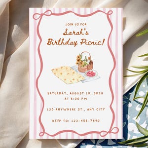 May include: A pink and white striped invitation with a watercolor illustration for Sarah's Birthday Picnic. The invitation includes the date, time, and location, with a decorative border and a picnic basket illustration.