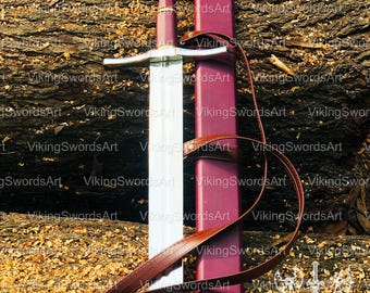 May include: A longsword with a silver blade and a burgundy handle and scabbard. The sword has a crossguard and a pommel with a gold emblem. A brown leather strap is wrapped around the scabbard. The background is a wooden log.