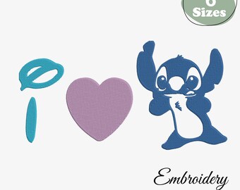 Può includere: Un disegno per ricamo con le parole "I heart", una "i" blu, un cuore viola e un personaggio dei cartoni animati blu. Il disegno include il testo "Embroidery by Digital LoomGB" e il testo "6 Sizes".
