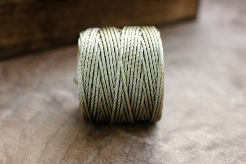S-lon Tex 400 Nylon Cord 0.9mm 35 yards Grey 105 feet S-lon Tex 400 Nylon Cord 0.9mm 35 yards Grey 105 feet