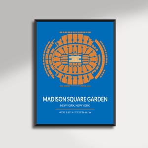 May include: A framed print featuring a top-down view of Madison Square Garden in orange on a blue background. The text "MADISON SQUARE GARDEN" and location coordinates are displayed below the arena illustration.