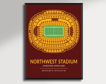 May include: A framed print featuring a top-down view of Northwest Stadium in Landover, Maryland. The stadium is depicted in gold against a maroon background, with a green field. The text "NORTHWEST STADIUM" is displayed.