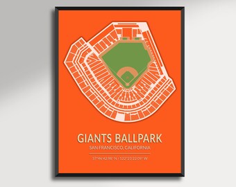 May include: A framed print featuring a detailed, white outline of a baseball stadium on an orange background. The stadium's green field and brown infield are visible. Text at the bottom reads "GIANTS BALLPARK, SAN FRANCISCO, CALIFORNIA."