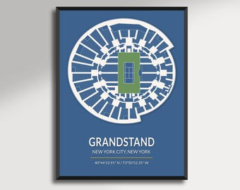 May include: A framed print featuring a detailed architectural diagram of a tennis stadium. The design is in white against a blue background, with a green tennis court at the center. The text "GRANDSTAND" and location details are included.