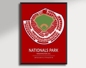 May include: A framed print featuring a detailed, stylized map of Nationals Park in Washington, D.C. The stadium is depicted in red and white against a red background. The text "NATIONALS PARK WASHINGTON, D.C." is displayed below the stadium illustration.