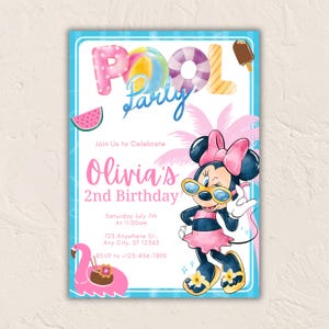 May include: A vibrant pool party invitation with the words "Pool Party" and "Olivia's 2nd Birthday." The design incorporates a cartoon character, a watermelon slice, a flamingo, and other summer-themed illustrations. The invitation is framed with a light blue border.