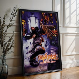 May include: Framed art print featuring a stylized illustration of a figure in motion with a reaching hand. The artwork has a purple and blue background with the words "Wild Spirit" and "significant other" in a stylized font. The print is in a black frame.
