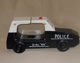 Police Car piggy bank with see thru sides.