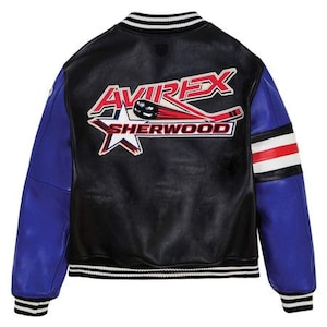 May include: Black leather varsity jacket with blue sleeves and white, red, and black striped accents. The back features the text "AVIREX SHERWOOD" with a hockey stick and star graphic.
