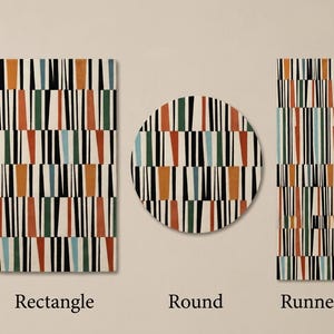 May include: Three rugs in rectangle, round, and runner shapes featuring a repeating pattern of vertical black lines interspersed with solid orange, green, and light blue geometric shapes. The text labels Rectangle, Round, and Runner appear below.
