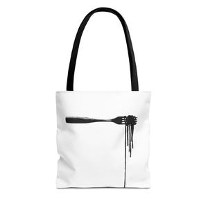 May include: White tote bag with black handles featuring a black illustration of a fork with spaghetti. The spaghetti strands are dripping down from the fork. The bag is made of a durable material.