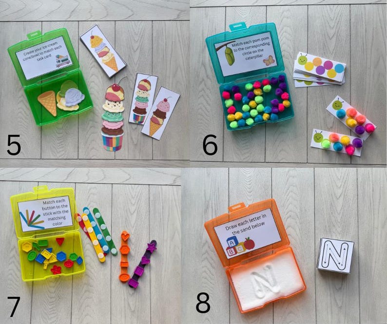 May include: A collection of educational toys for children. Includes a green box with ice cream pieces and cards, a teal box with pom-poms and caterpillar cards, a yellow box with buttons and sticks, and an orange box with sand and letter cards.
