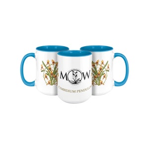May include: Three white ceramic mugs with a blue rim. The mugs feature a floral design with yellow orchids and a black and white logo that says "MOW" and "CYMBIDIUM PENDULUM".