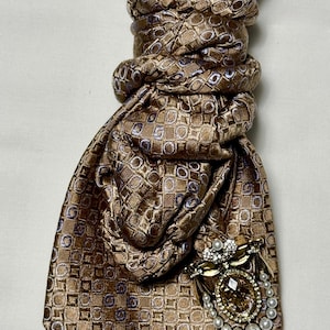 Custom Upcycled Necktie to be worn as a necklace or a brooch