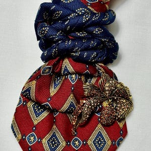 Custom Upcycled Necktie to be worn as a necklace or a brooch