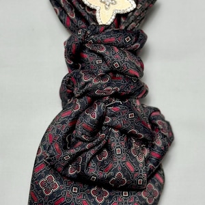 Custom Upcycled Necktie to be worn as a necklace or a brooch