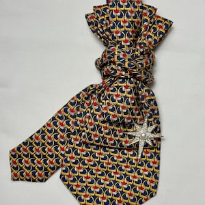 Custom Upcycled Necktie to be worn as a necklace or a brooch
