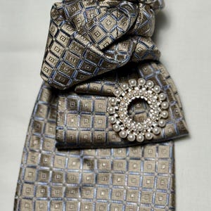 Custom Upcycled Necktie to be worn as a necklace or a brooch