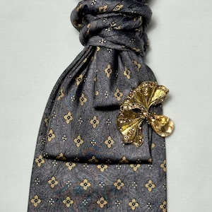 Custom Upcycled Necktie to be worn as a necklace or a brooch