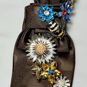 Custom Upcycled Necktie to be worn as a necklace or a brooch