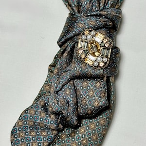 Custom Upcycled Necktie to be worn as a necklace or a brooch