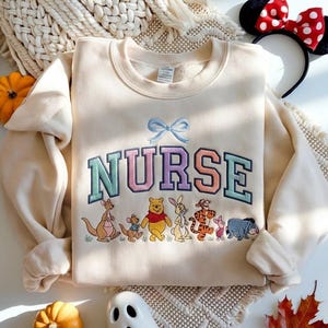 Embroidered Disney Winnie The Pooh Nurse Sweatshirt, Registered Nurse Crewneck, Pooh Nurse Shirt, Nurse Sweatshirt, Pooh Bear Shirt, RN Gift