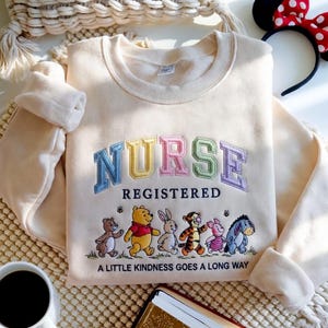Disney Winnie The Pooh Nurse Embroidered Sweatshirt, Registered Nurse Crewneck, Pooh Nurse Shirt, Nurse Sweatshirt, Pooh Bear Shirt, RN Gift