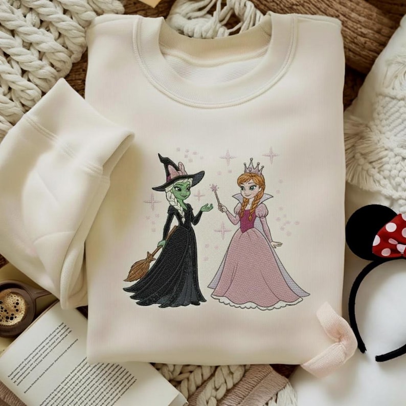 Wicked Elsa and Anna Embroidered Sweatshirt, Elphaba and Glinda Shirt, Frozen Elsa Sweatshirt, Frozen Anna Sweatshirt, Broadway Fan Gift image 1