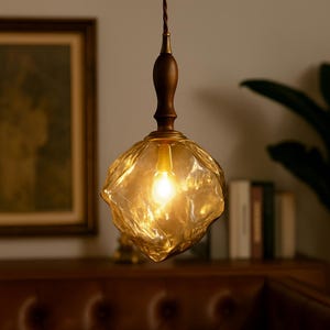 Handcrafted Amber Glass Pendant Light: Walnut & Brass Accents, Adjustable Cord