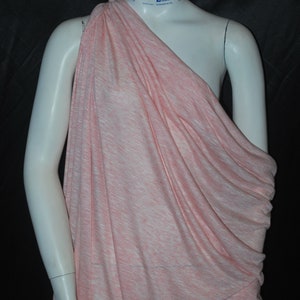May include: A pink and white striped fabric draped over a white mannequin. The fabric is soft and flowing, and it has a subtle sheen.