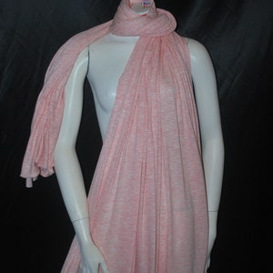 May include: A pink and white striped scarf made of a soft, stretchy fabric. The scarf is draped over a mannequin.