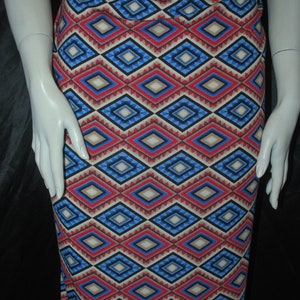 Rayon Stretch Jersey Knit Fabric Beautiful Tribal Print cherry red blue combo rayon spandex 9 oz by the yard